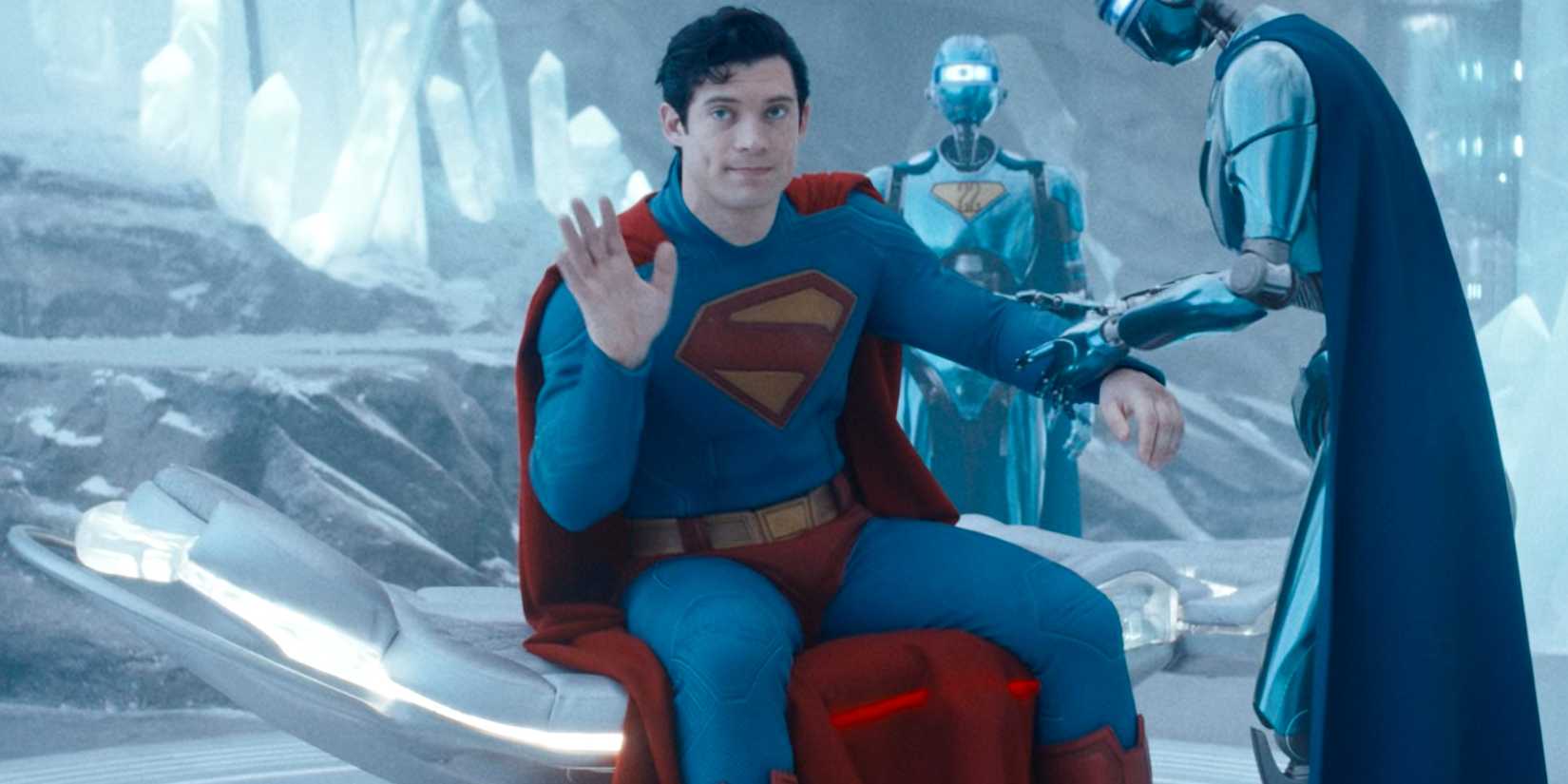 David Corenswet's Superman waving as a robot treats him in the Fortress of Solitude