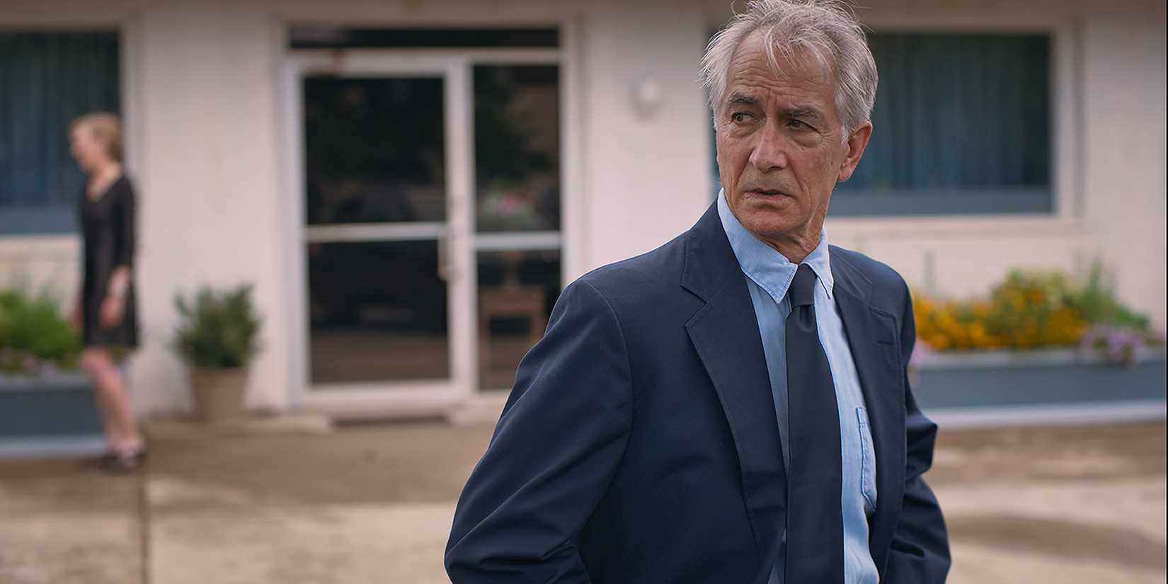 David Strathairn's Bill looking into the distance suspiciously in A Little Prayer