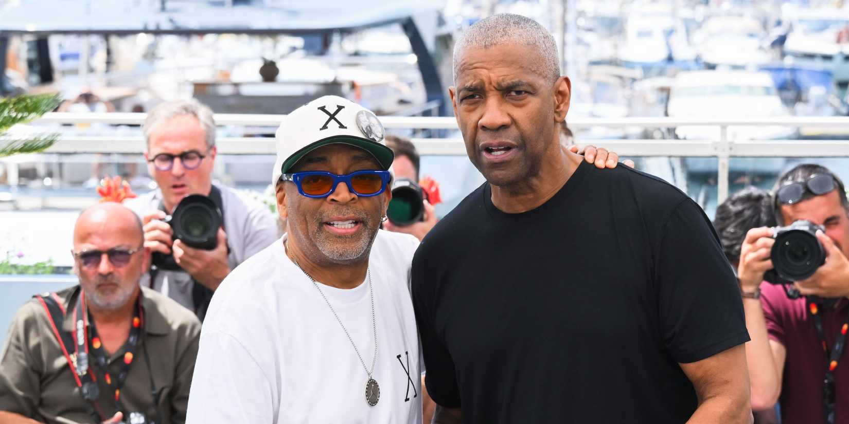 Denzel Washington and Spike are shaking hands at Cannes