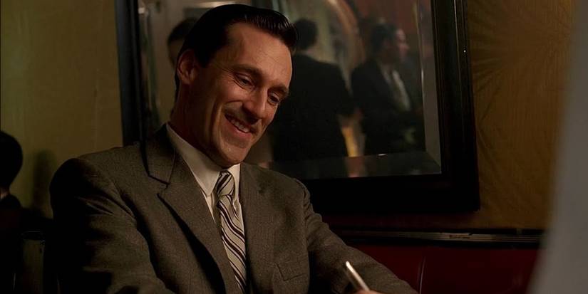 Don smiling in the Mad Men pilot