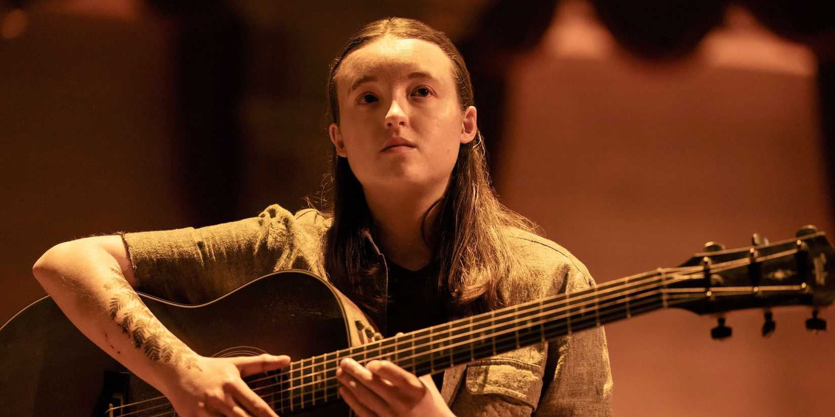 Ellie holding a guitar in The Last of Us season 2