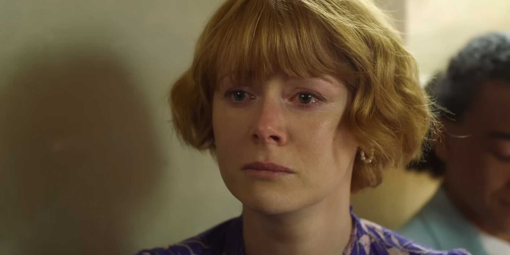 Emily Beecham's Georgina looking sad in a church in My Mother's Wedding