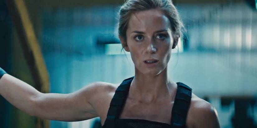 Emily Blunt reaching to her right in Edge of Tomorrow
