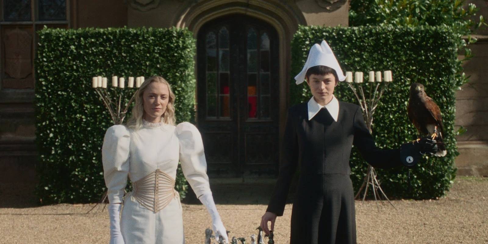 Emma Corrin and Maika Monroe in 100 Nights of hero