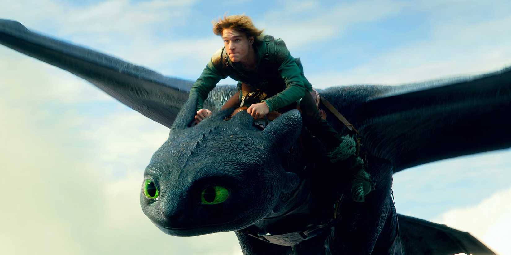 Mason Thames as Hiccup flying on Toothless in How to Train Your Dragon