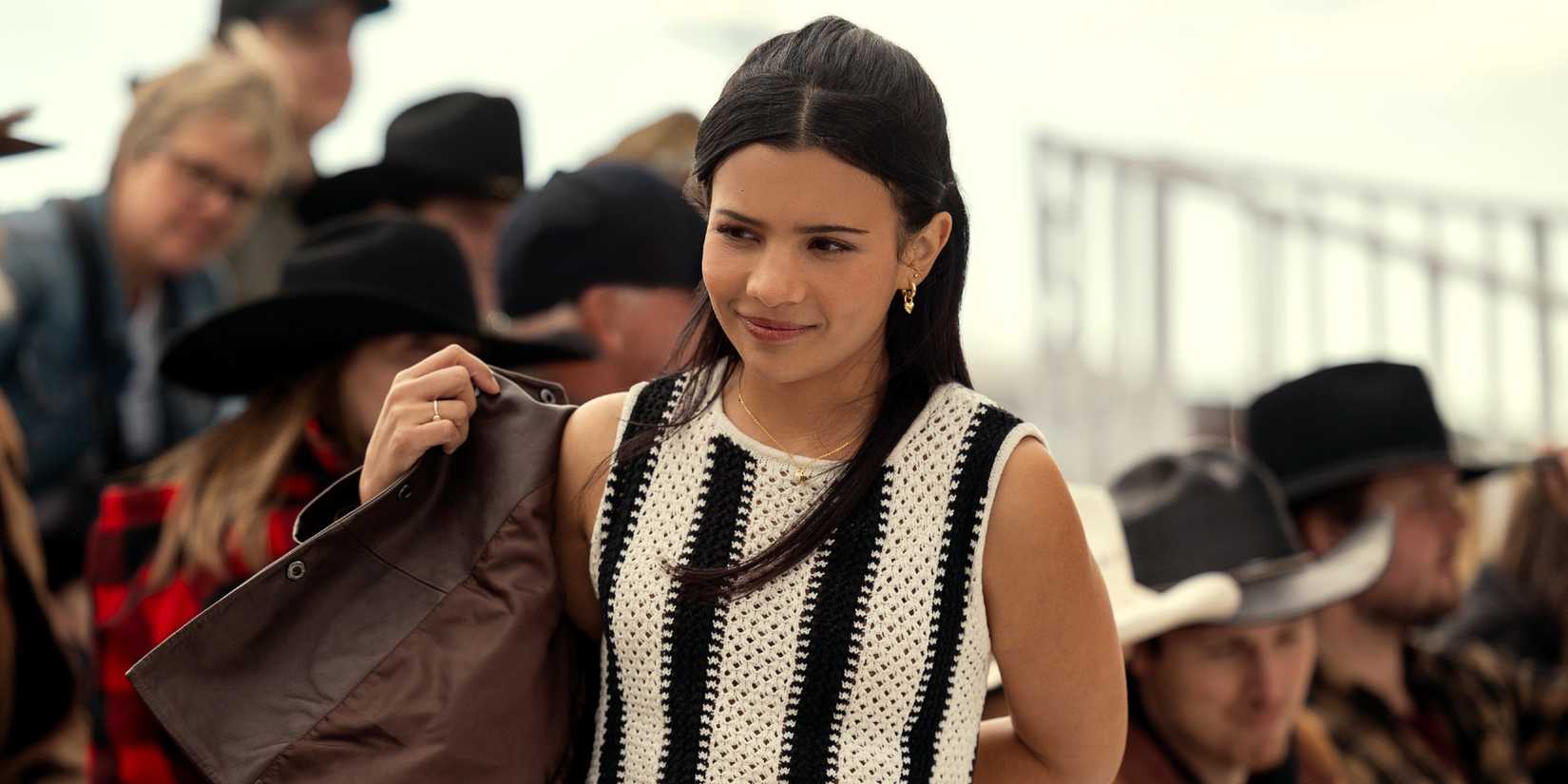 Nikki Rodriguez as Jackie Howard putting on a jacket in My Life With the Walter Boys season 2 