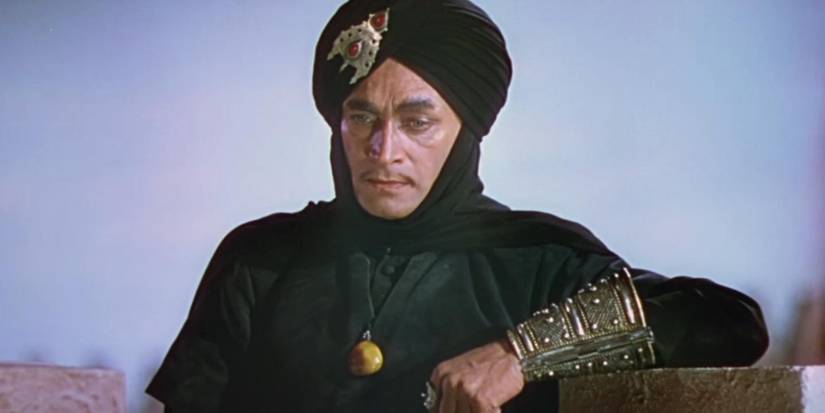 Jaffar stands in deep thought in Thief of Bagdad
