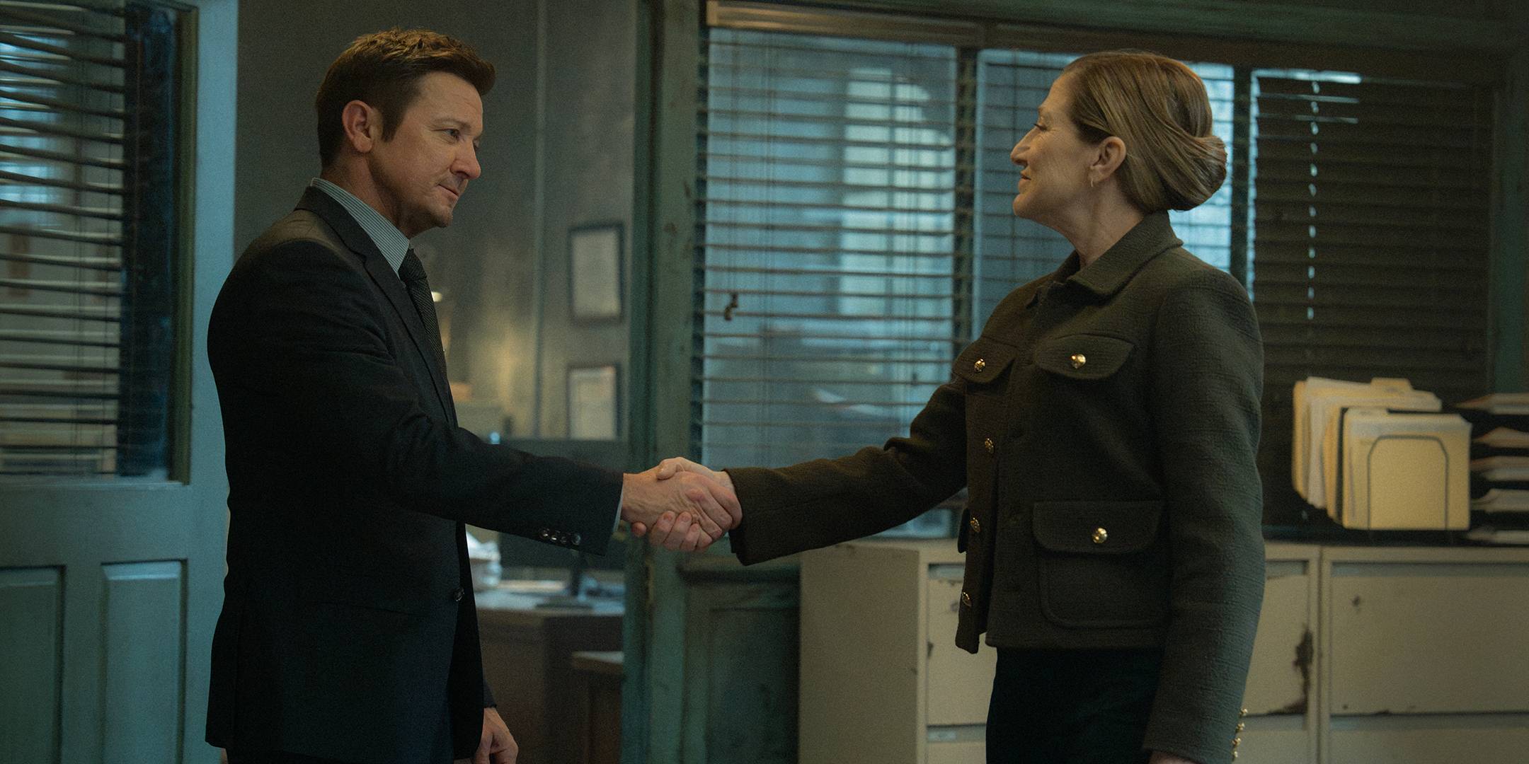 Jeremy Renner's Mike shaking hands with Edie Falco's Nina in Mayor of Kingstown season 4