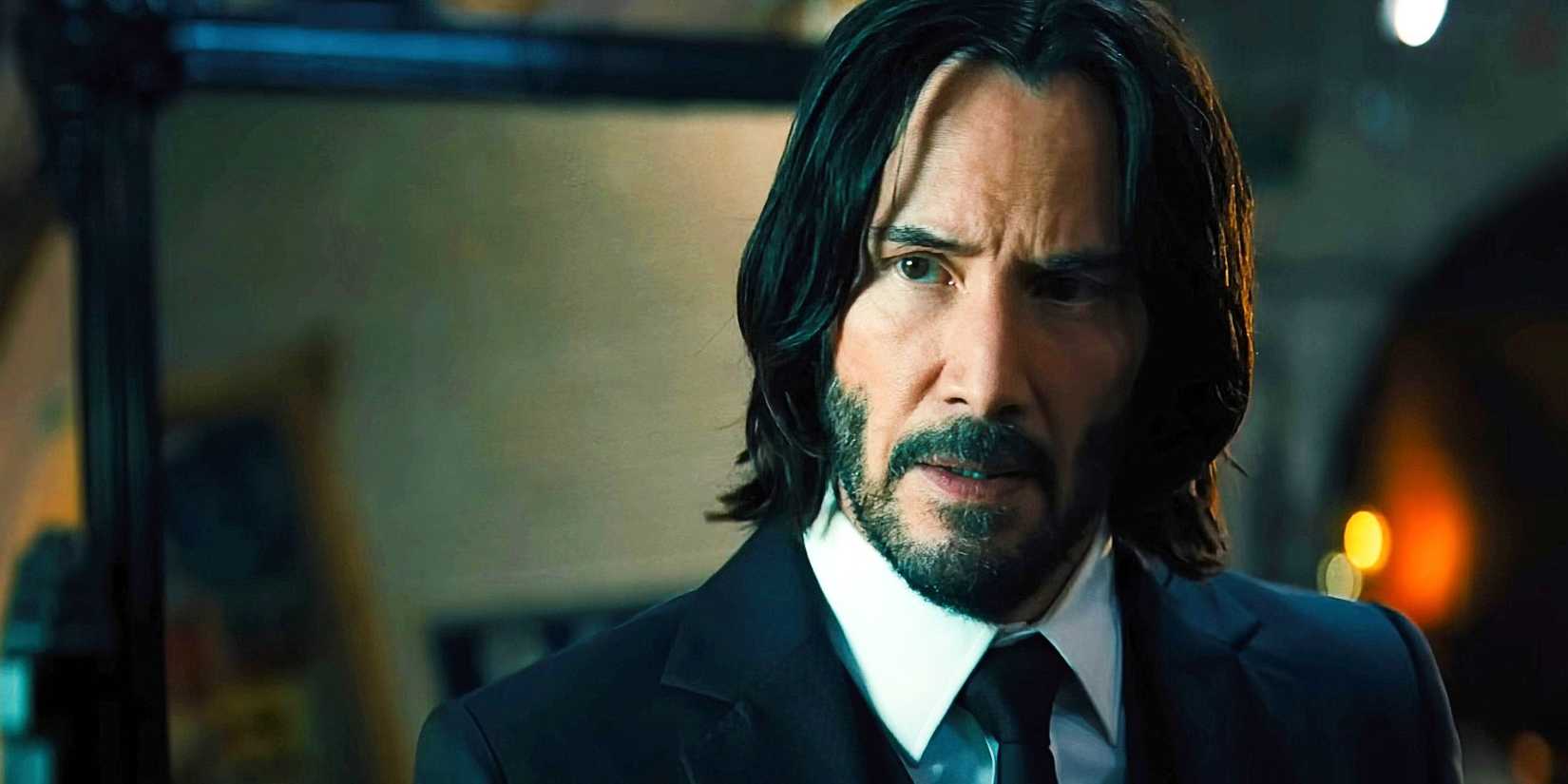 John looks perturbed at someone offscreen in John Wick Chapter 4