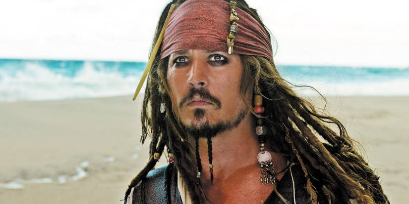 Johnny Depp as Jack Sparrow looking into the distance in Pirates of the Caribbean