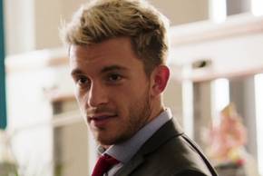 Sam, played by Jonathan Bailey, looks smug in Crashing