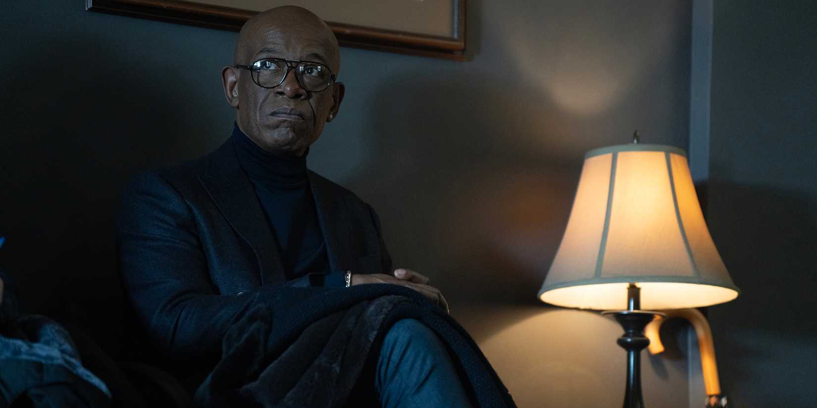 Lennie James' Frank Moses looking intensely while seated in Mayor of Kingstown season 4