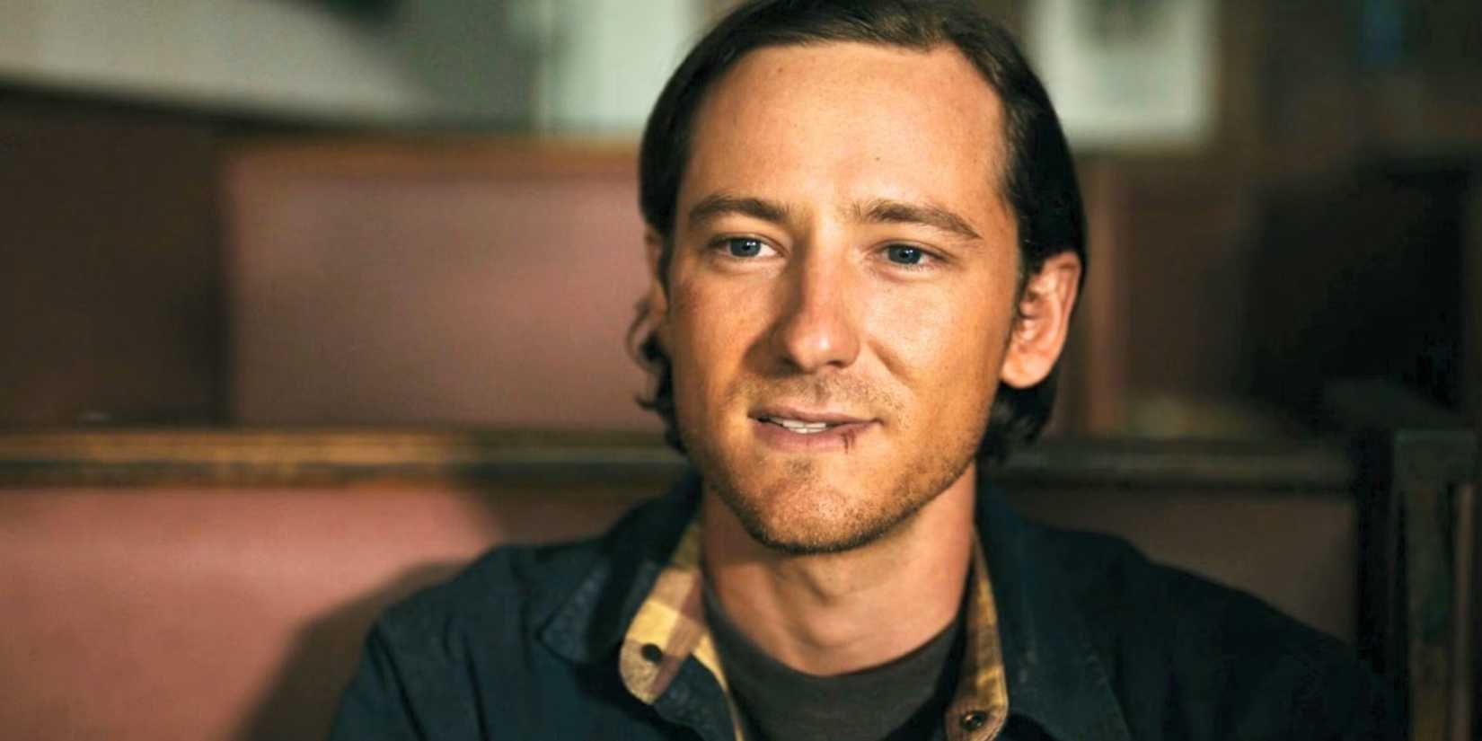 Lewis Pullman smiling in Outer Range for Prime Video