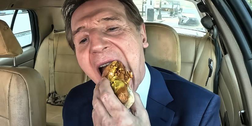 Liam Neeson eating a H๏τ dog in the car in The Naked Gun