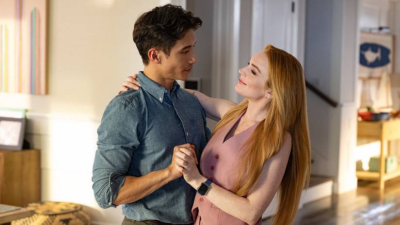 Manny Jacinto and Lindsay Lohan dancing in the living room in Freakier Friday