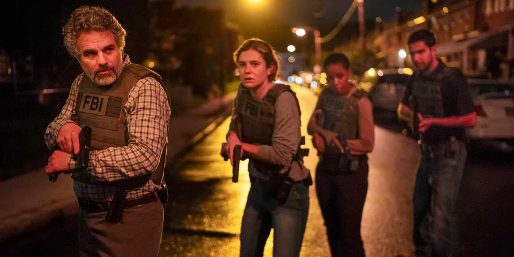 Mark Ruffalo and Allison Oliver hold guns as they approach a crime scene in Task