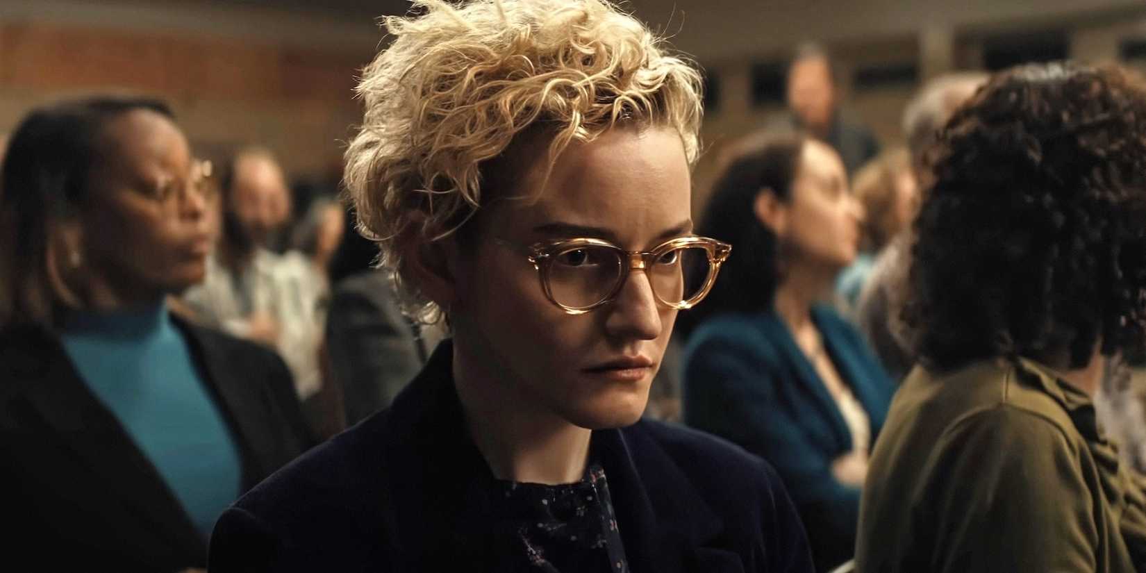 Julia Garner at a PTA meeting in Weapons