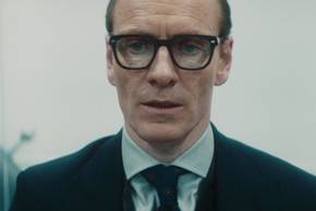 Michael Fassbender looks forward dramatically in a scene from Black Bag