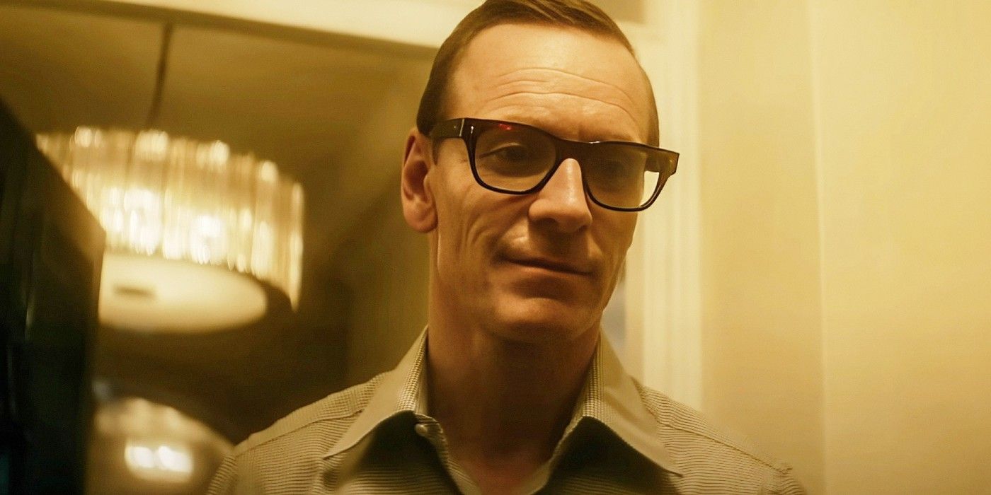 Michael Fassbender smirking in Black Bag