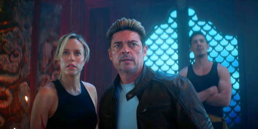 Johnny Cage, Sonya Blade, and Cole Young standing together in Mortal Kombat II.