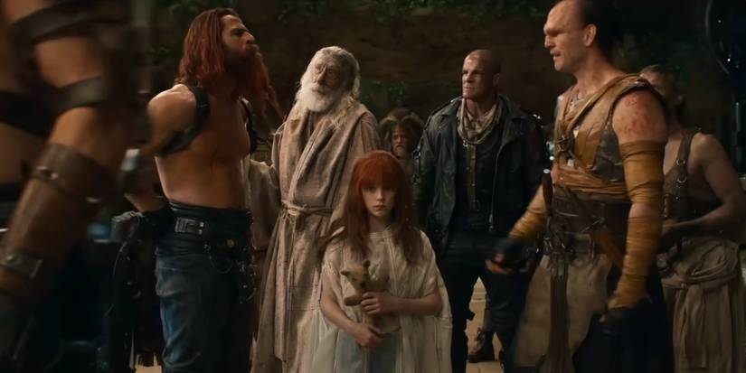 Mr Harley looking upset about Furiosa being traded by Dementus in Furiosa: A Mad Max Saga