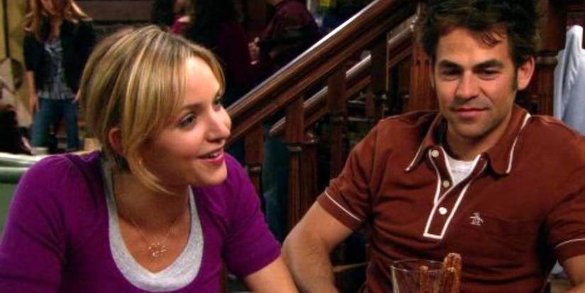 PJ (Jordana Spiro) and Brandon (Kyle Howard) sitting next to each other on My Boys