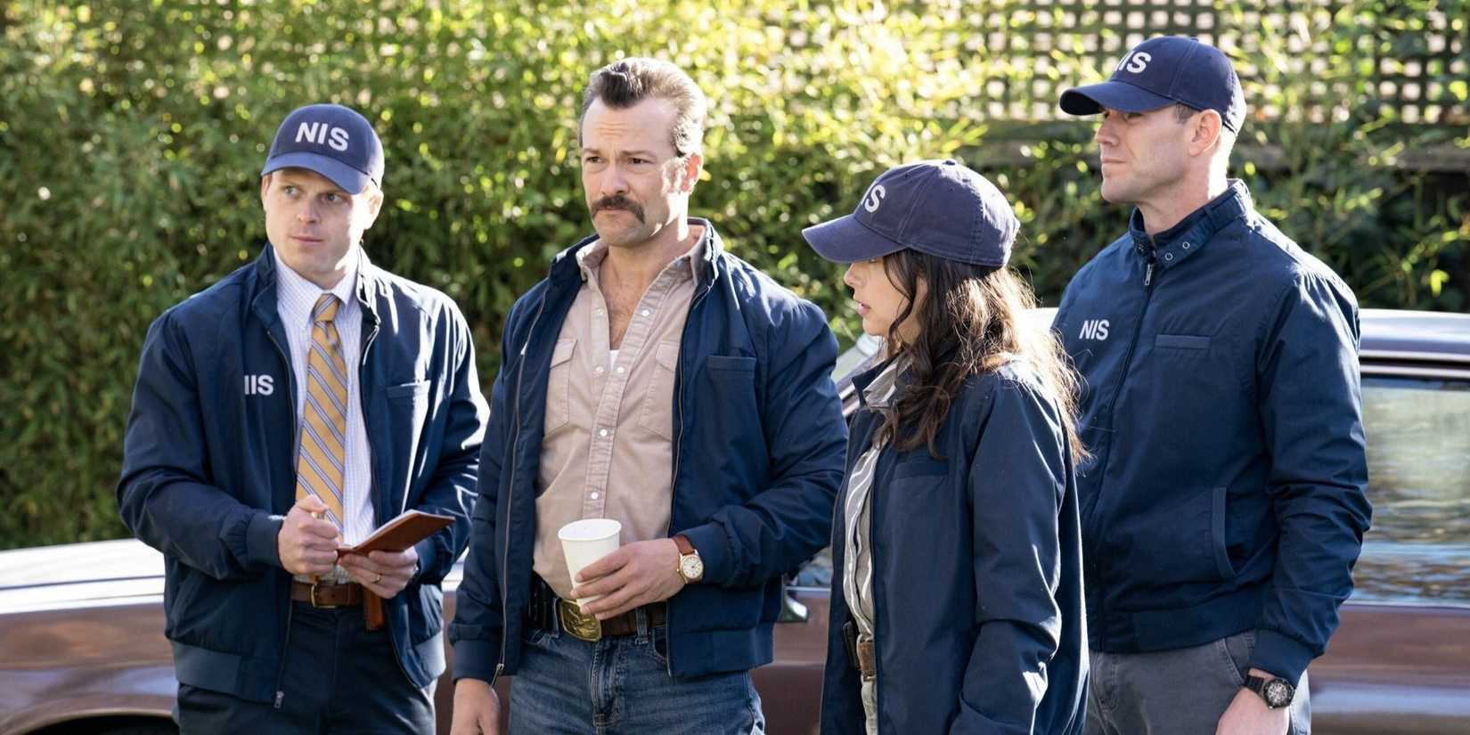 NCIS Origins cast (Caleb Foote as Randy, Kyle Schmid as Mike Franks, Mariel Molino as Lala, Austin Stowell as Gibbs) standing at a crime scene