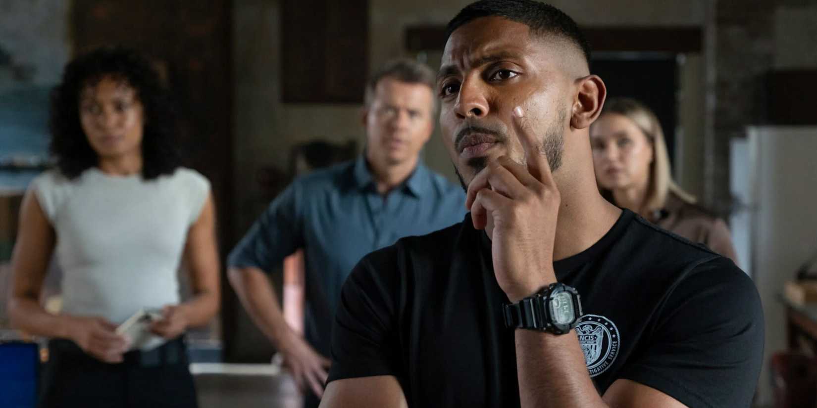 NCIS Sydney's DeShawn (Sean Sagar) in the foreground while Mackey (Olivia Swann), JD (Todd Lasance), and Evie (Tuuli Narkle) are in the background