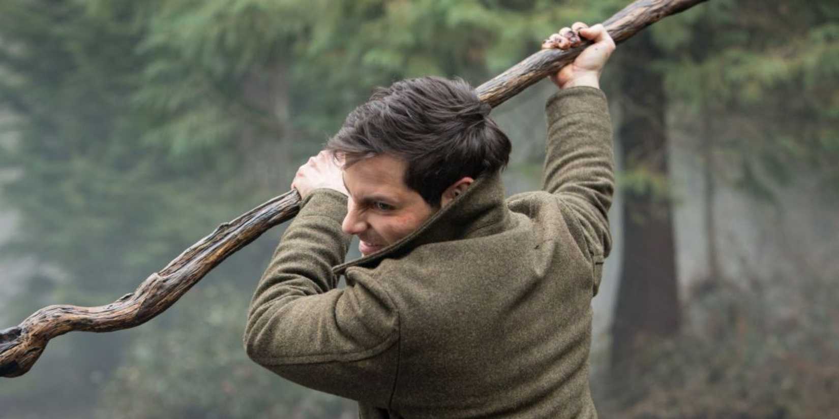 Nick (David Giuntoli) fighting with a stick in Grimm.