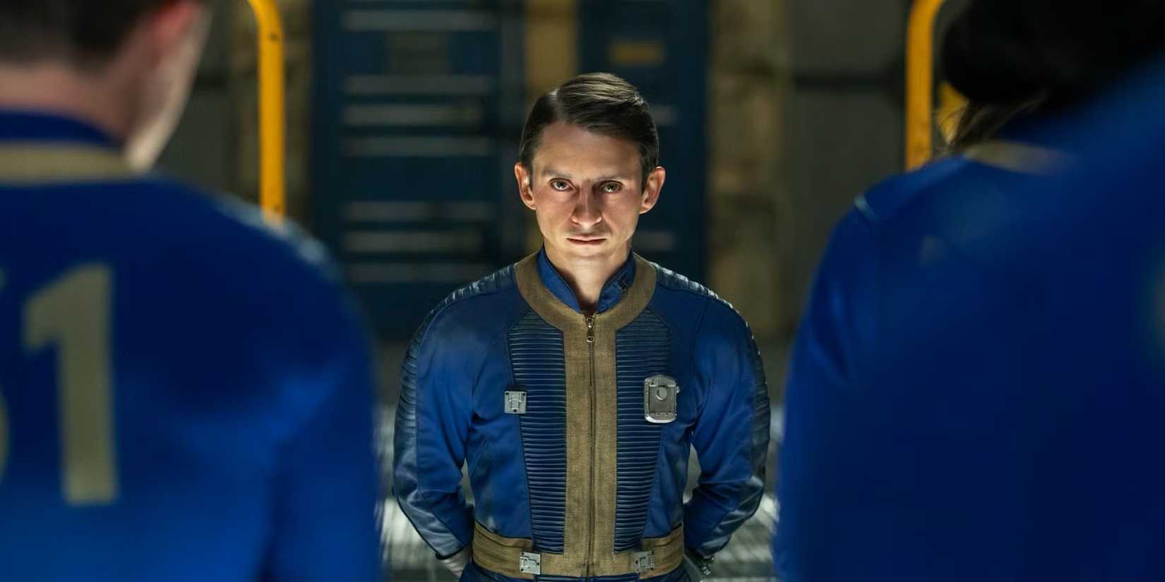 Norm MacLean (Moisés Arias) in front of other Vault dwellers in Fallout season 2 