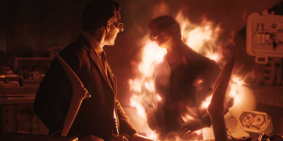 Pedro Pascal Reed Richards looking at Joseph Quinn Johnny Storm as he burns in The Fantastic Four First Steps