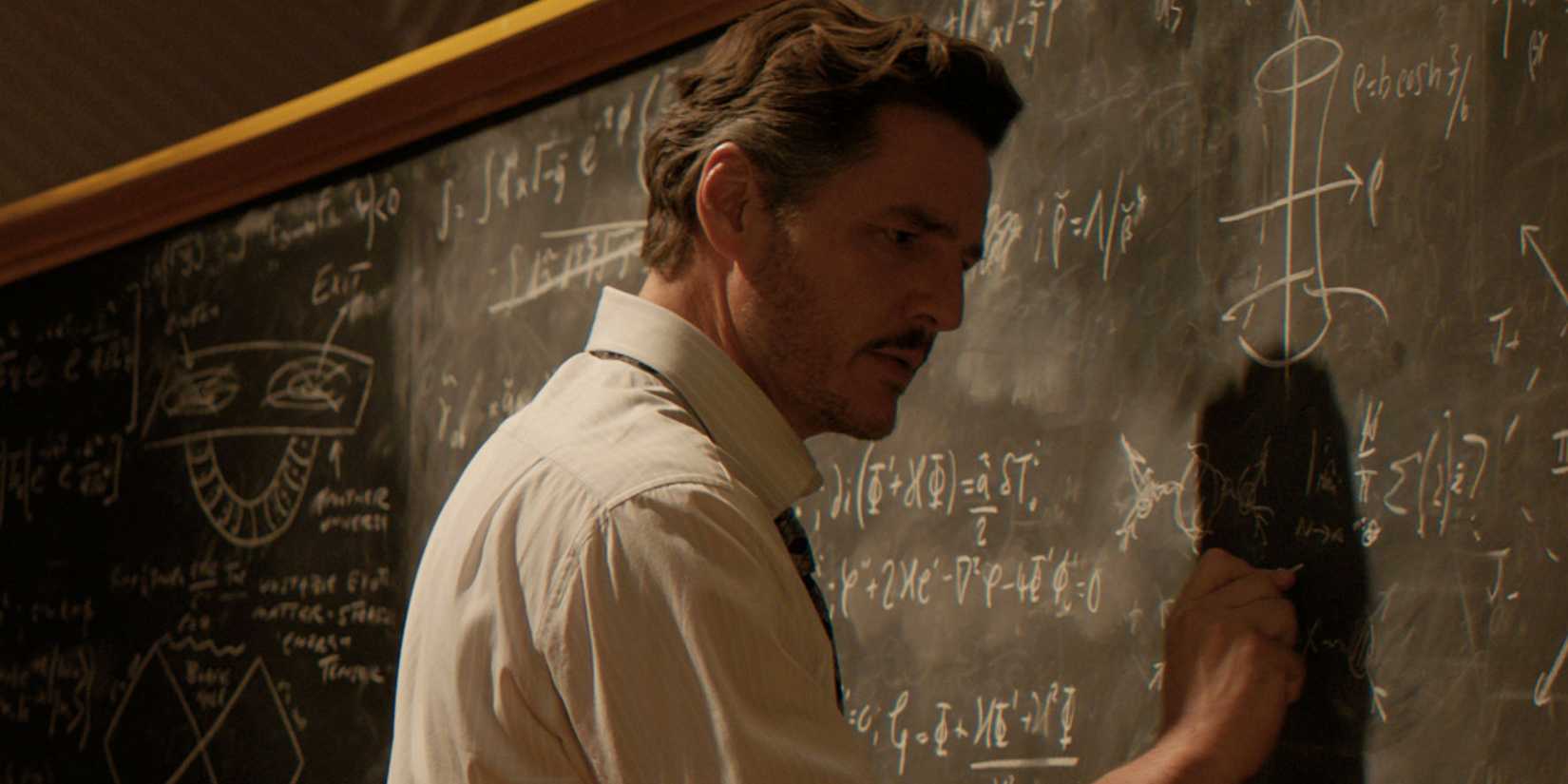 Pedro Pascal's Reed Richards writing on a chalk board in The Fantastic Four First Steps