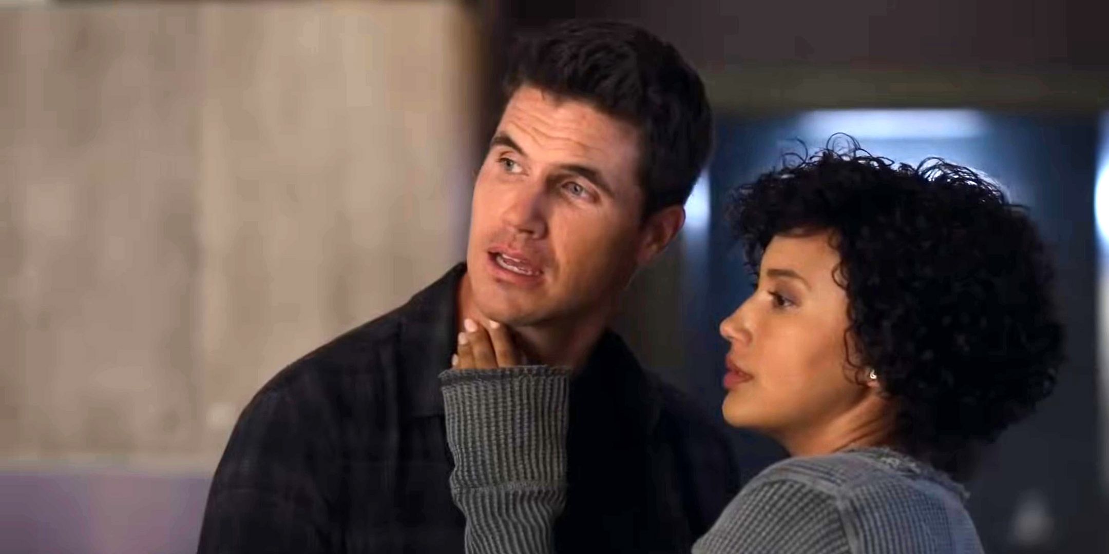 Robbie Amell's Nathan and Andy Allo's Nora looking uncertain after kissing in Upload season 3