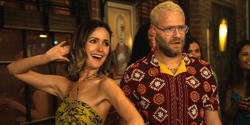 Rose Byrne dancing and Seth Rogen looking concerned in Platonic
