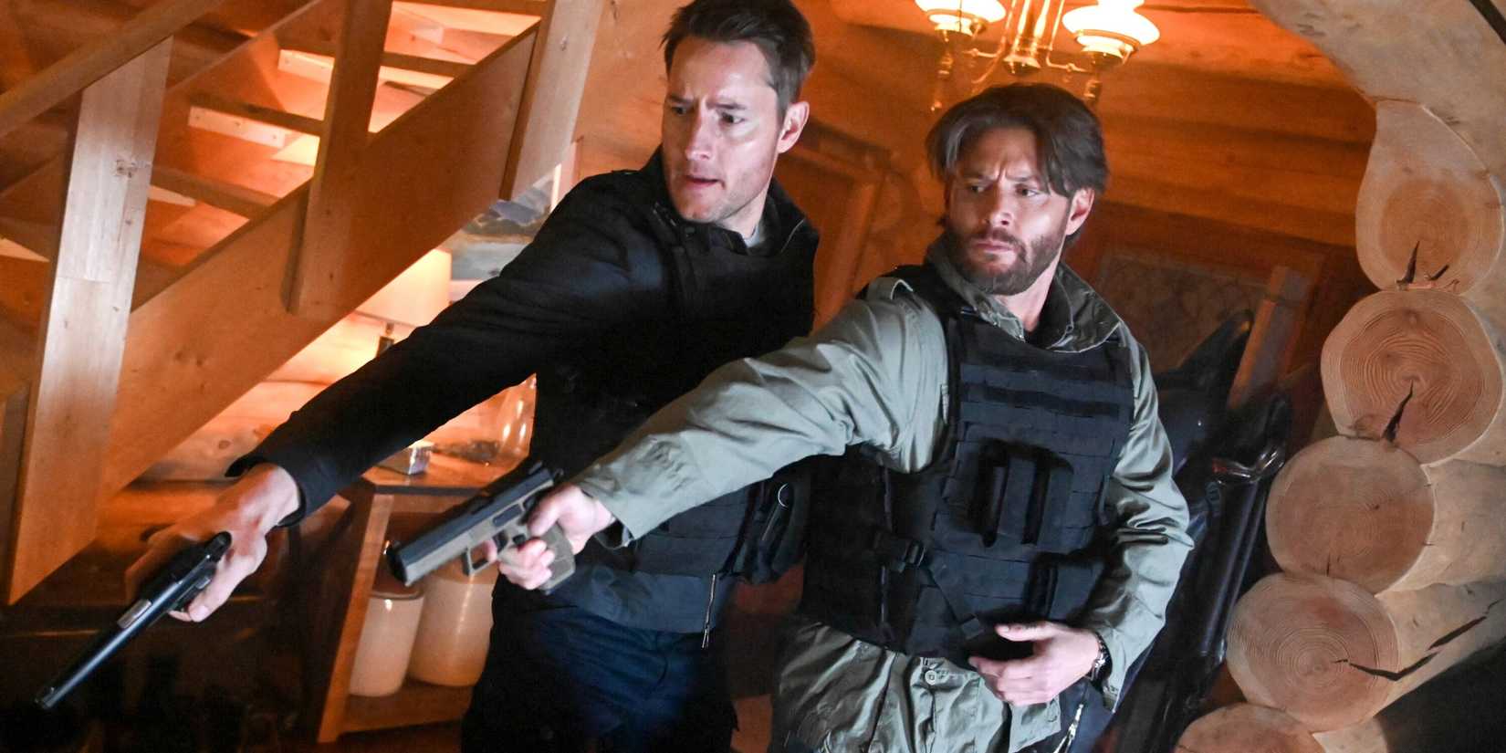 Colter Shaw (Justin Hartley) and his brother Russell (Jensen Ackles) in bulletproof vests with guns drawn in Tracker