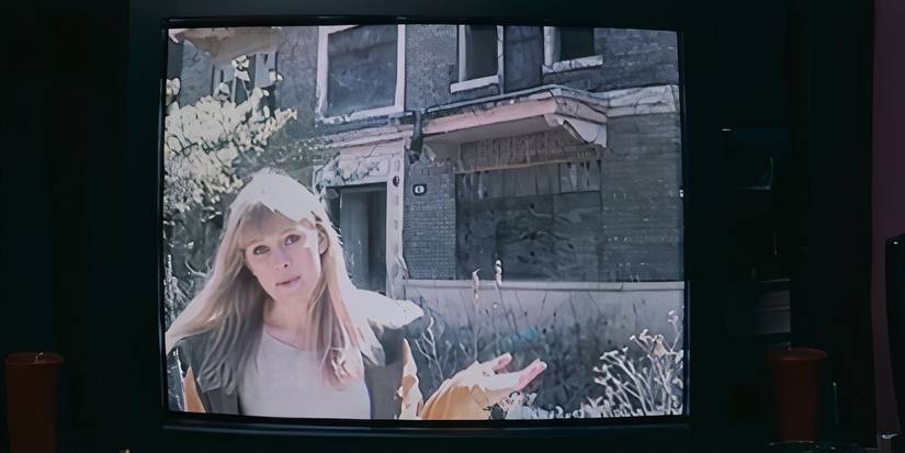 Sarah Durn in an old video played on a television in the horror film Shelby Oaks