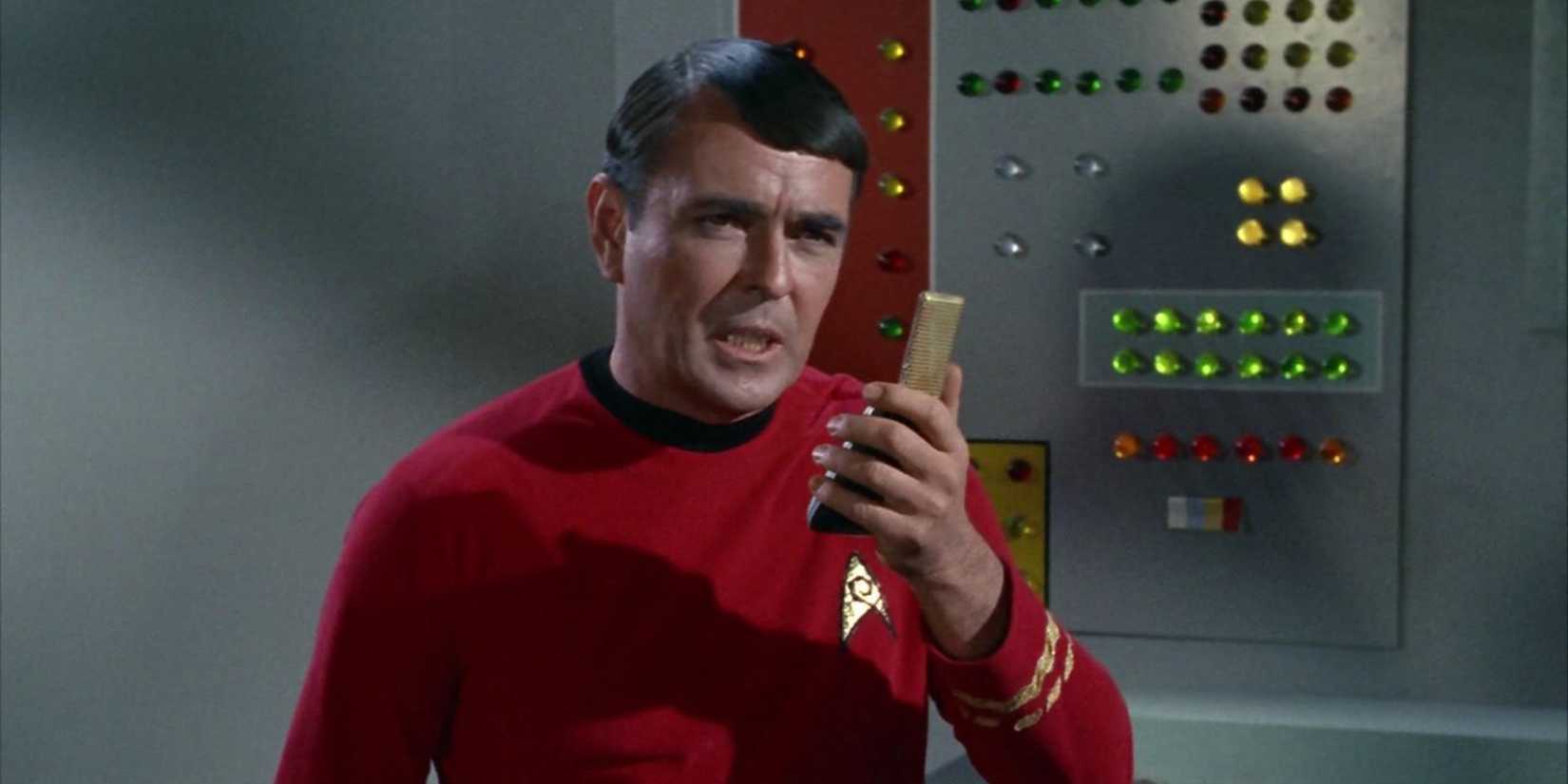 Scotty using a communicator in Star Trek TOS