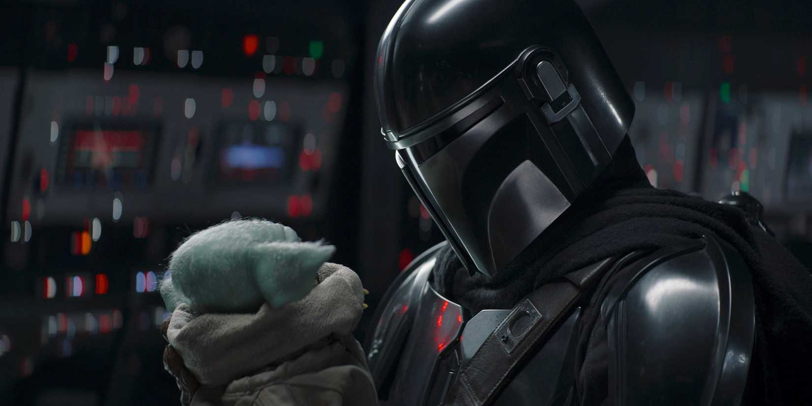 Din Djarin (Pedro Pascal) and Grogu face one another as they prepare to say goodbye.