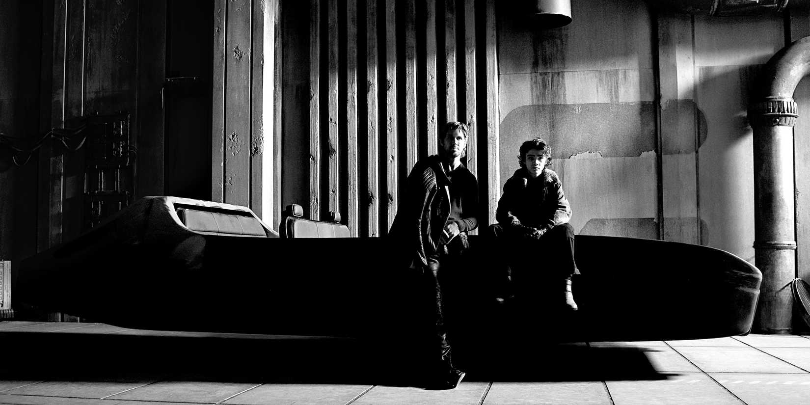Ryan Gosling and Flynn Gray stand and sit side-by-side on the set of Star Wars: Starfighter