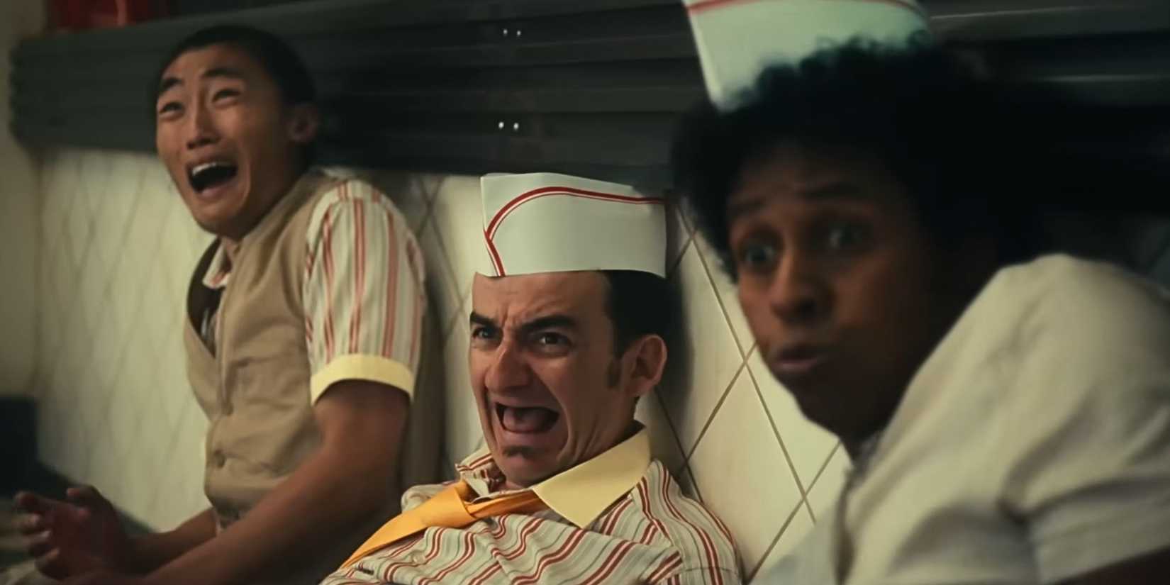 A horrified restaurant crew in The Toxic Avenger