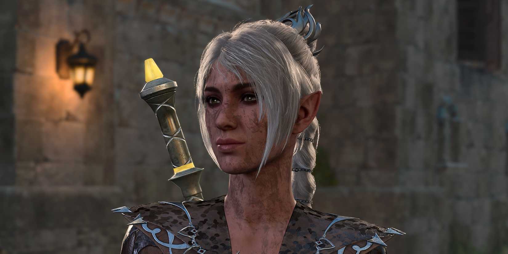 Shadowheart smiling with dirt on her face in Baldur's Gate 3