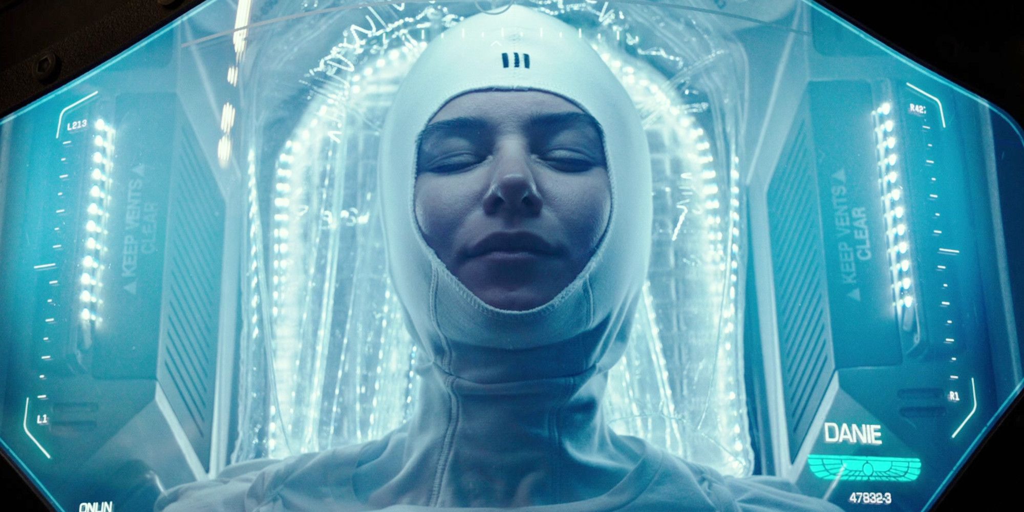 Katherine Waterston with her eyes closed while in hypersleep in a scene from Alien: Covenant