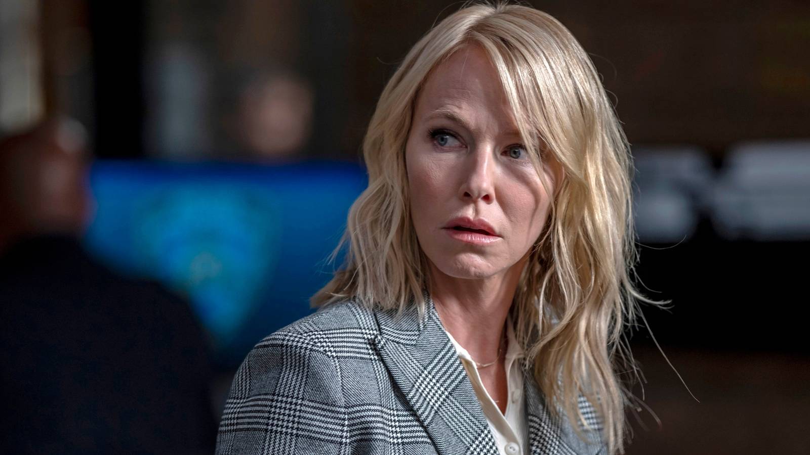 Kelli Giddish as Amanda Rollins looking over her shoulder in Law & Order: SVU