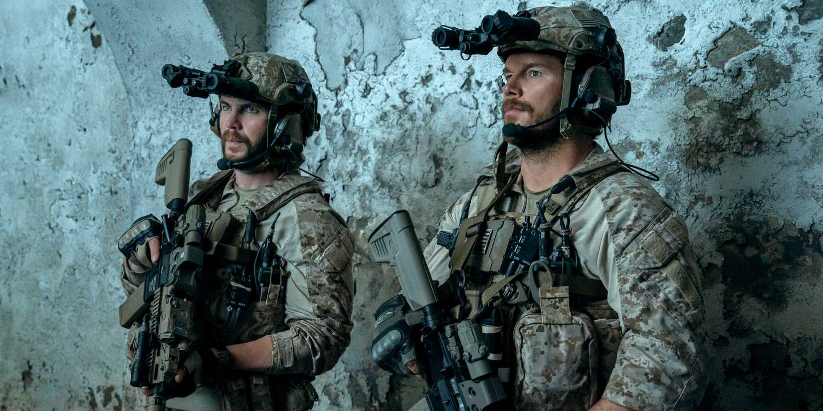 Taylor Kitsch's Ben and Chris Pratt's Reece looking stoic while in their army uniforms and holding rifles in The Terminal List: Dark Wolf