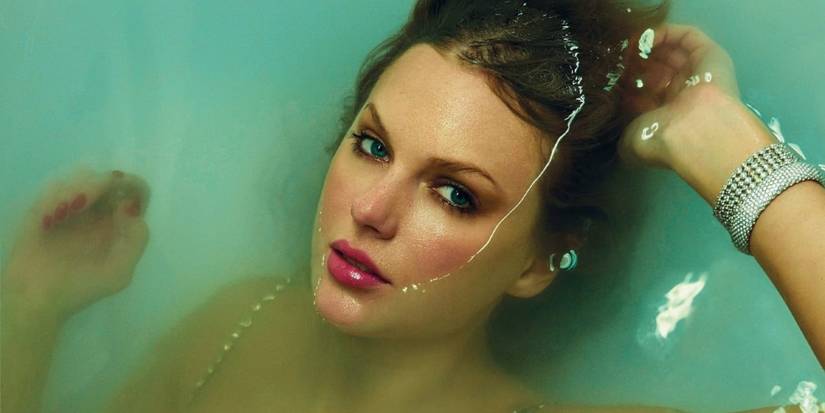 Taylor Swift submerged in water on the Life Of A Showgirl cover