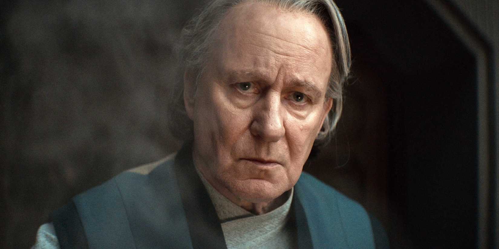 Luthen Rael looking up at Dedra Meero coming into his antiques shop in Andor season 2, episode 10