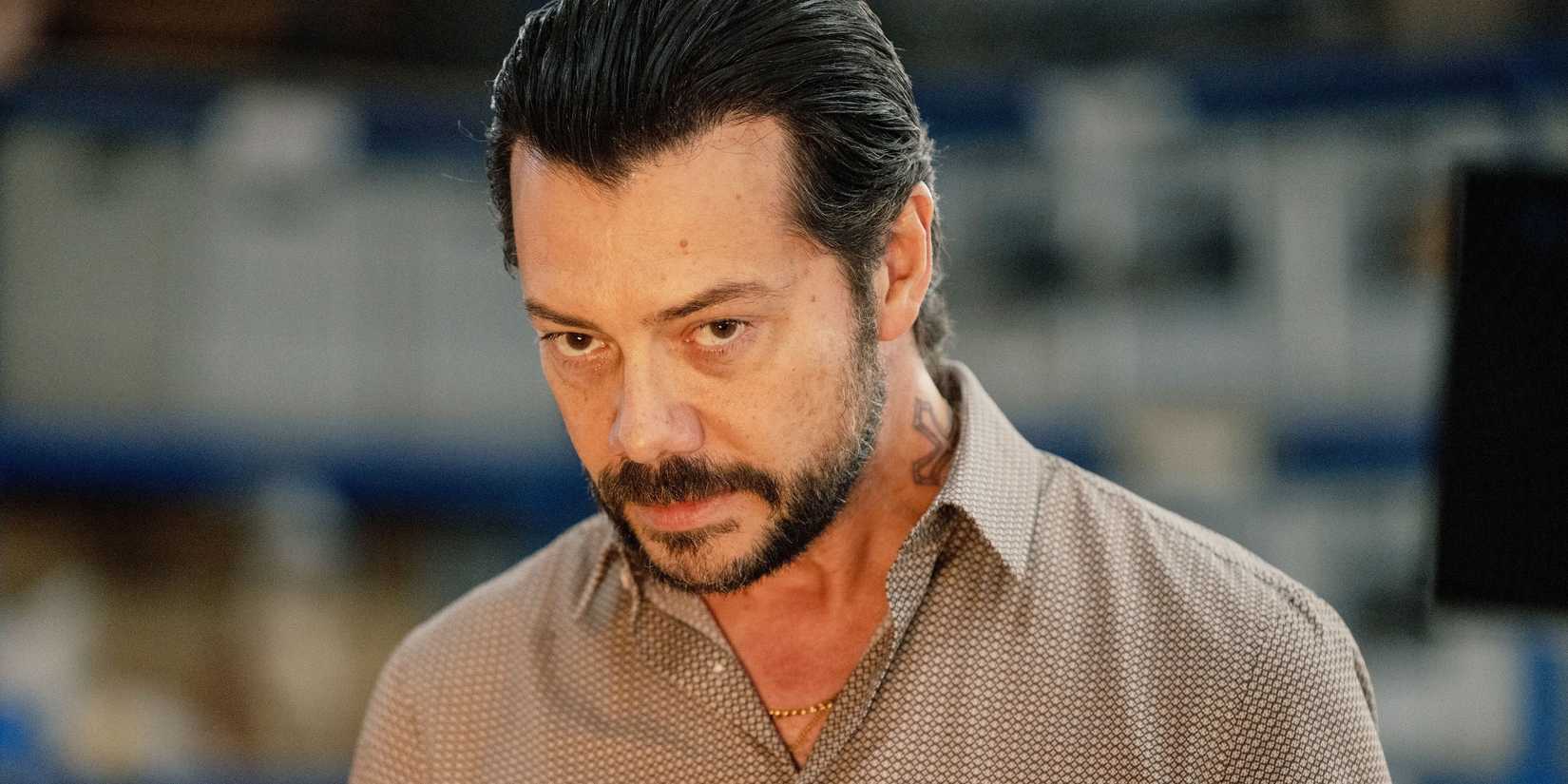 Alvaro Morte looking ahead intently in Netflix's Two Graves