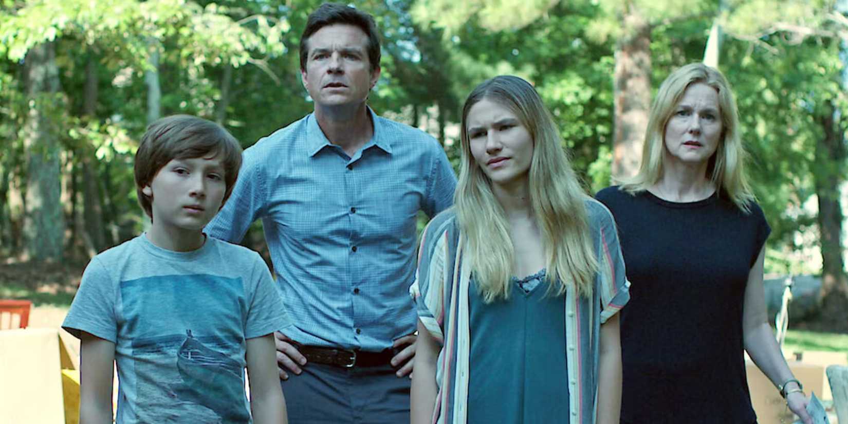 The Byrde family standing outside in Ozark