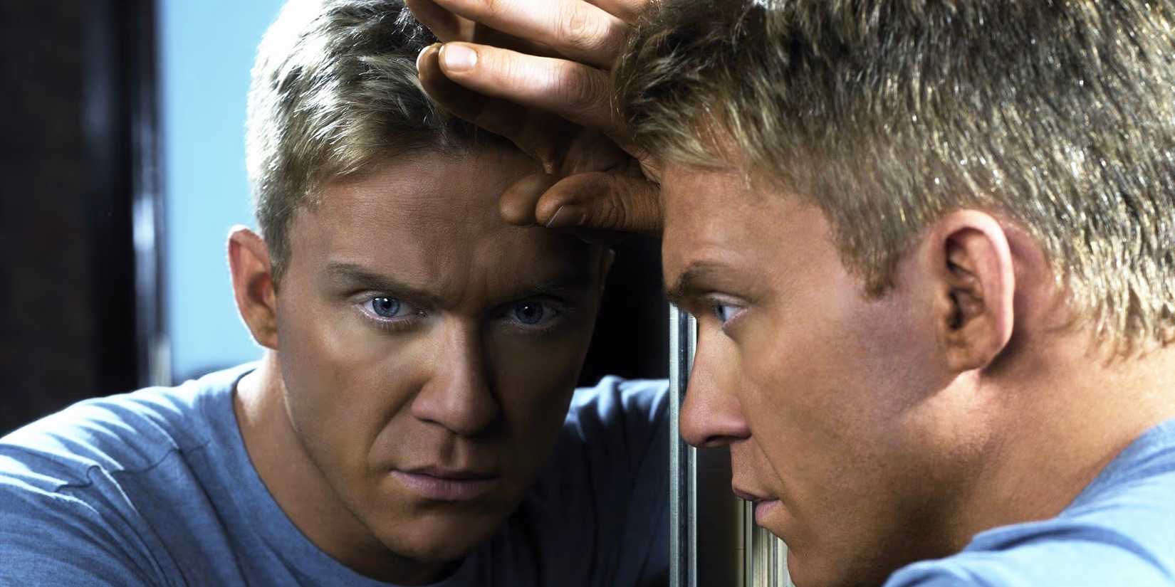 The Dead Zone Johnny in front of a mirror