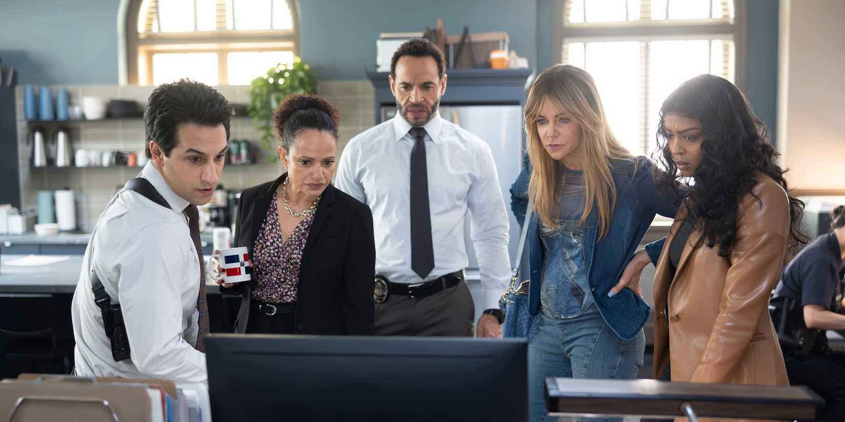 The detectives and Morgan stand around a computer screen on High Potential